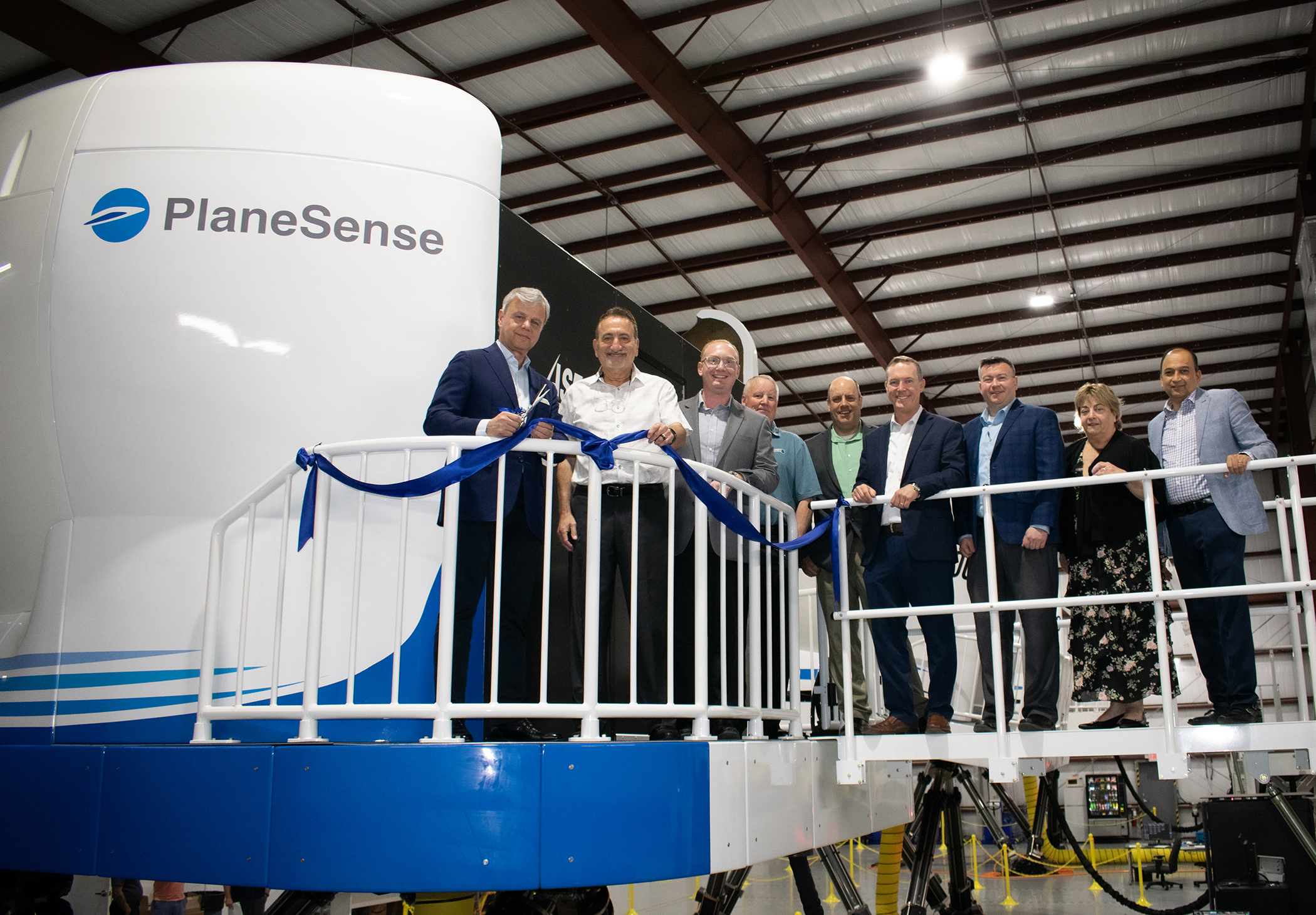 PlaneSense Full Motion Sim Ribbon Cutting